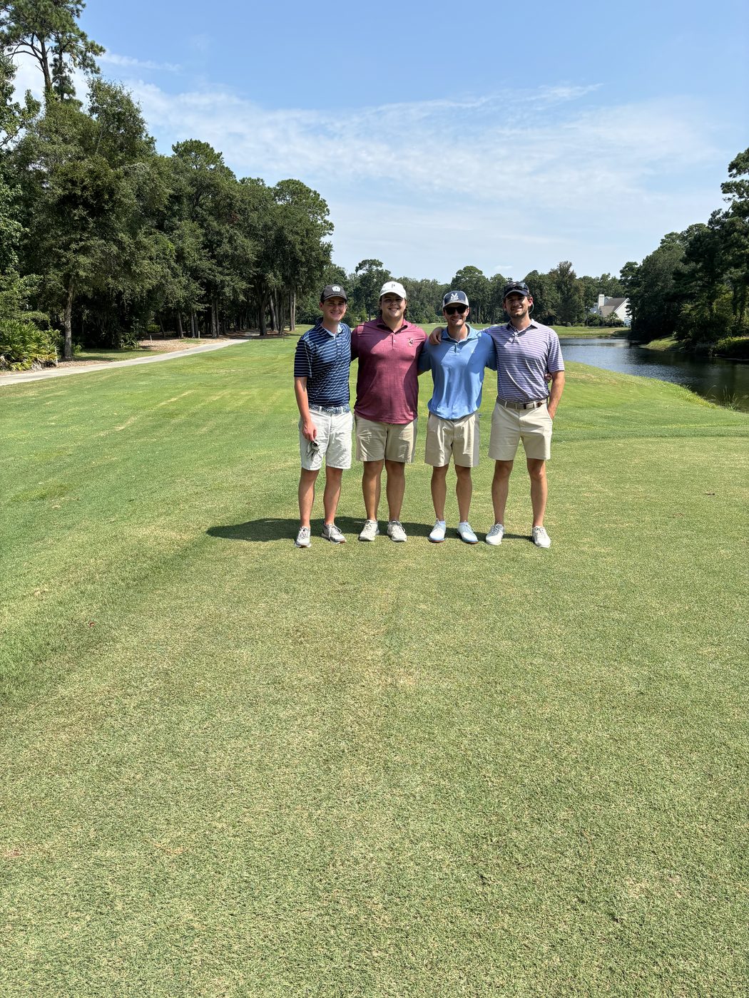 Foursome of golfers on a coastal South Carolina golf course